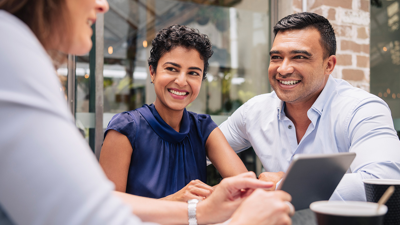 Business owners having a conversation with their client